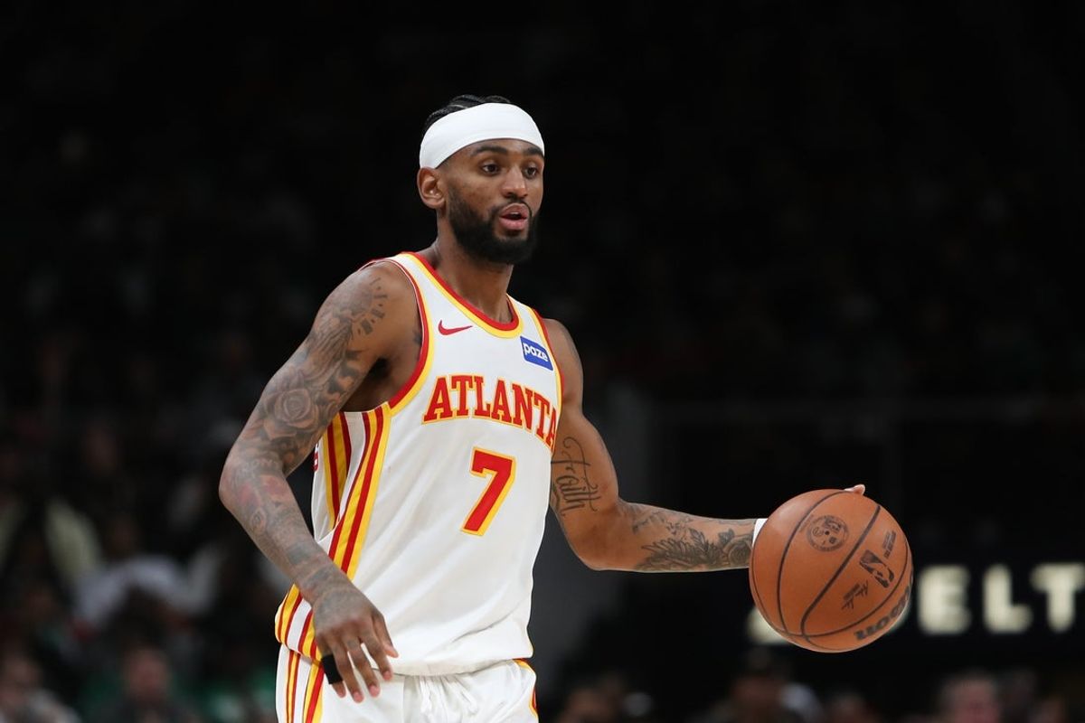 Mar 30, 2026; Atlanta, Georgia, USA; Atlanta Hawks guard Nickeil Alexander-Walker (7) controls the ball against the Boston Celtics in the second half at State Farm Arena. Mandatory Credit: Mady Mertens-Imagn Images