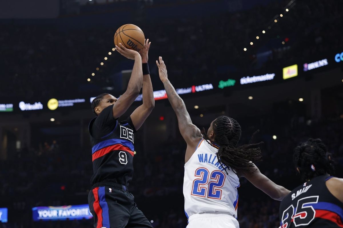 Mar 30, 2026; Oklahoma City, Oklahoma, USA; Detroit Pistons guard Ausar Thompson (9) shoots as Oklahoma City Thunder guard Cason Wallace (22) defends during the first half at Paycom Center. Mandatory Credit: Alonzo Adams-Imagn Images