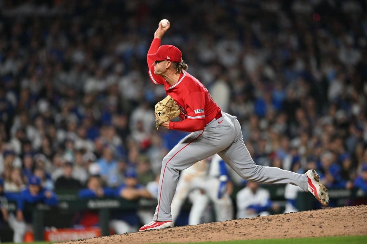 Mar 30, 2026; Chicago, Illinois, USA; Los Angeles Angels pitcher Shaun Anderson (64) pitches against the Chicago Cubs during the seventh inning at Wrigley Field. Mandatory Credit: Patrick Gorski-Imagn Images