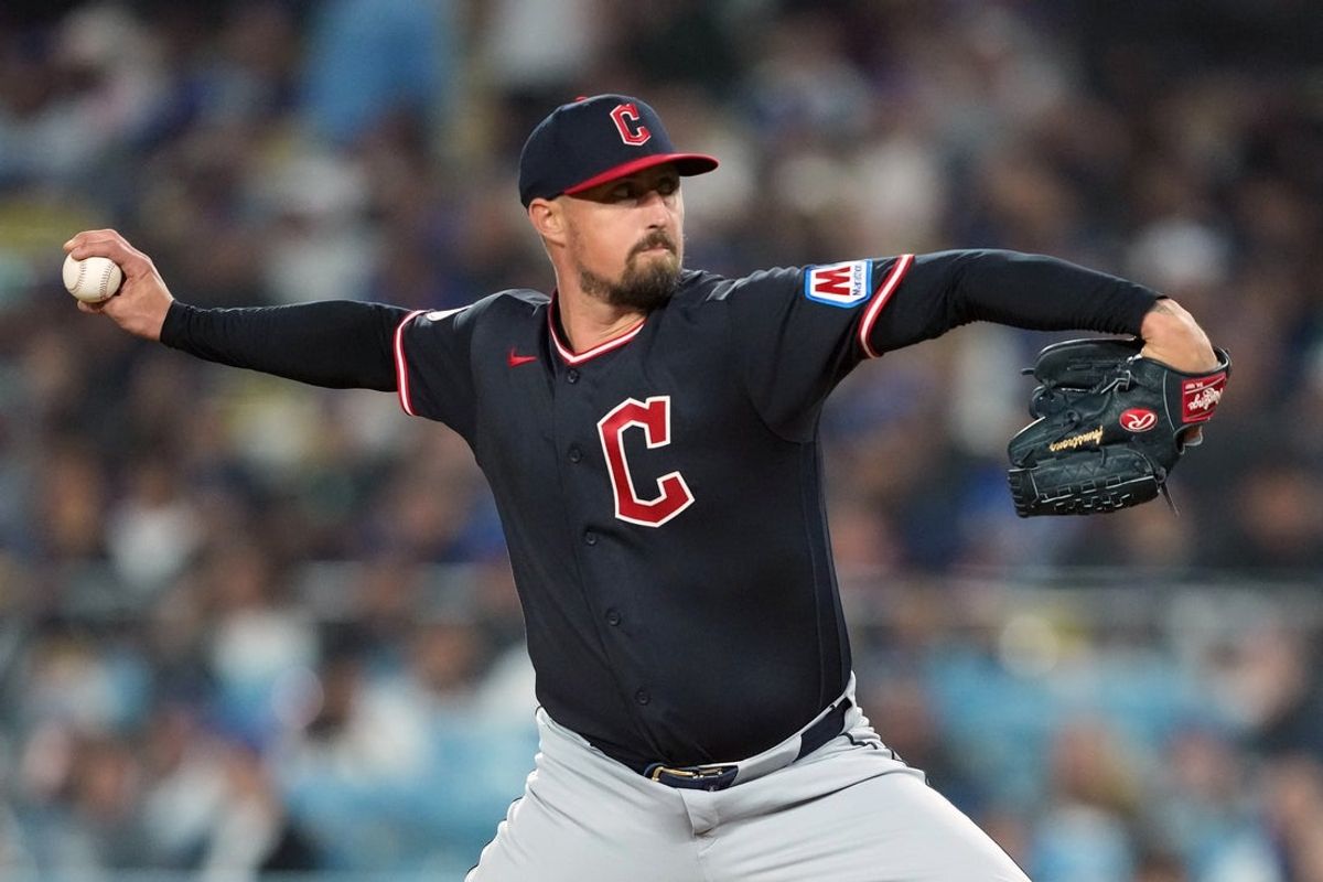 Mar 30, 2026; Los Angeles, California, USA;  Cleveland Guardians pitcher Shawn Armstrong (43) pitches seventh inning against the Los Angeles Dodgers at Dodger Stadium. Mandatory Credit: Kirby Lee-Imagn Images
