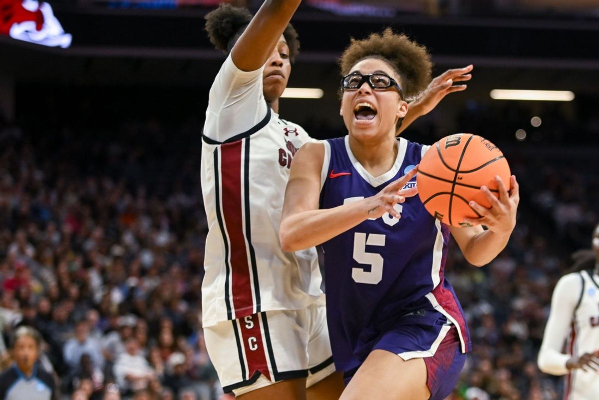 Mar 30, 2026; Sacramento, CA, USA;  Texas Christian University Horned Frogs guard Olivia Miles (5) drives to the basket against the South Carolina Gamecocks in an Elite Eight game in the Sacramento Regional 4 of the women's 2026 NCAA Tournament at the Golden 1 Center. Mandatory Credit: Ed Szczepanski-Imagn Images