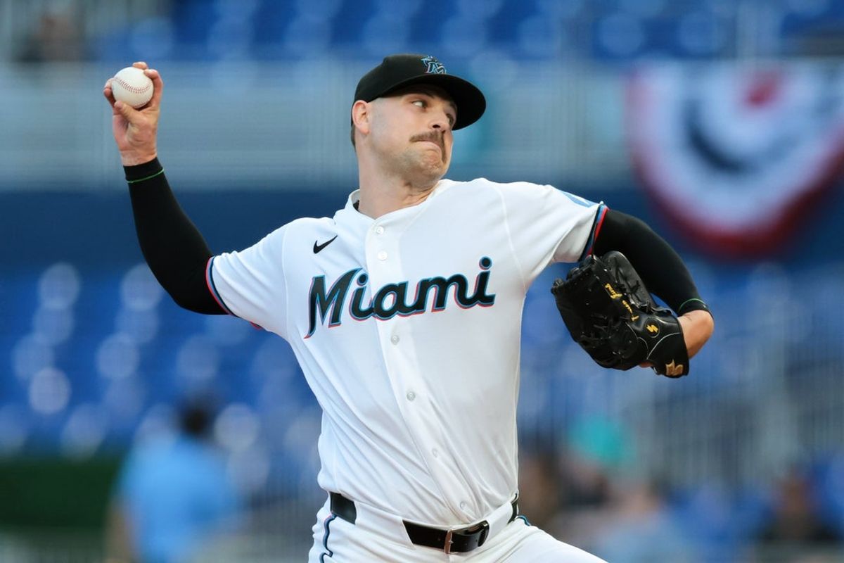Mar 31, 2026; Miami, Florida, USA; Miami Marlins starting pitcher Janson Junk (26) delivers a pitch against the Chicago White Sox during the first inning at loanDepot Park. Mandatory Credit: Sam Navarro-Imagn Images
