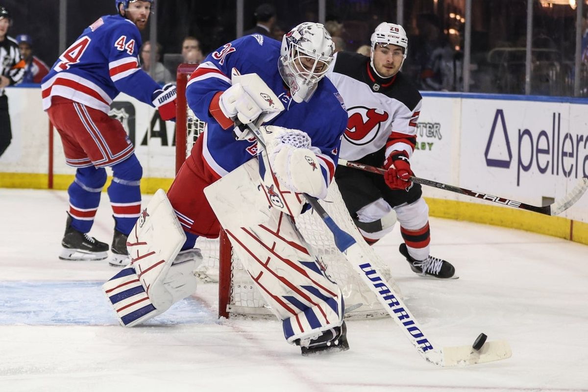 Mar 31, 2026; New York, New York, USA;  New York Rangers goaltender Igor Shesterkin (31) deflects the puck in the first period against the New Jersey Devils at Madison Square Garden. Mandatory Credit: Wendell Cruz-Imagn Images