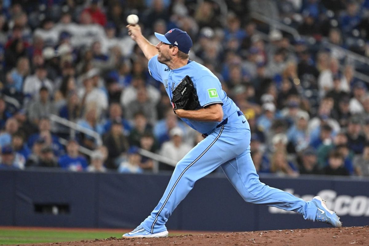 Mar 31, 2026; Toronto, Ontario, CAN; Toronto Blue Jays starting pitcher Max Scherzer (31) delivers a pitch against the Colorado Rockies in the first inning at Rogers Centre. Mandatory Credit: Dan Hamilton-Imagn Images