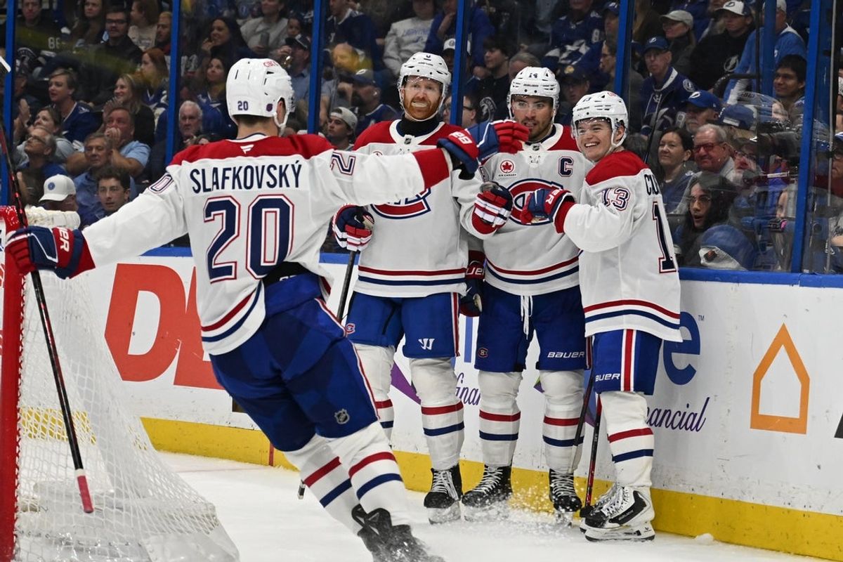 Mar 31, 2026; Tampa, Florida, USA;  Montreal Canadian right wing Cole Caufield (13) celebrates with his teammates after scoring a goal  in the second period against the Tampa Bay Lightning at Benchmark International Arena. Mandatory Credit: Jonathan Dyer-Imagn Images