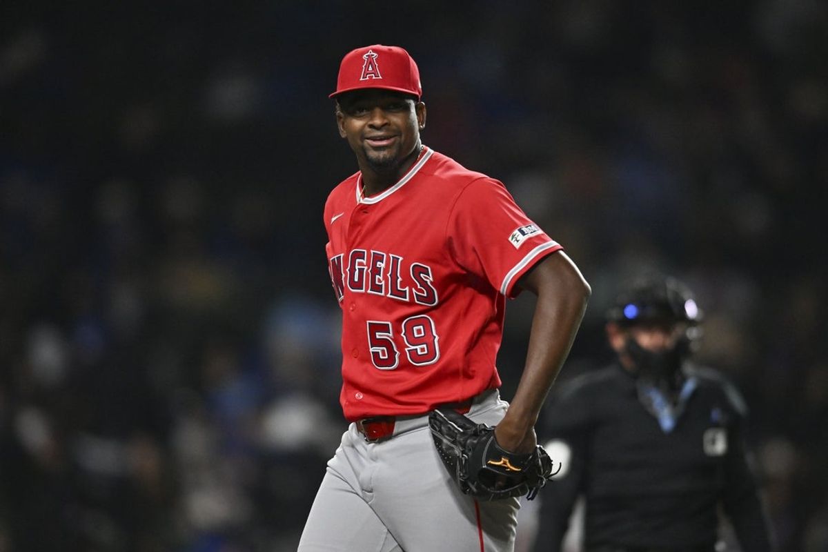 Mar 31, 2026; Chicago, Illinois, USA; Los Angeles Angels pitcher Jose Soriano (59) smiles after ending the the fifth inning against the Chicago Cubs at Wrigley Field. Mandatory Credit: Patrick Gorski-Imagn Images