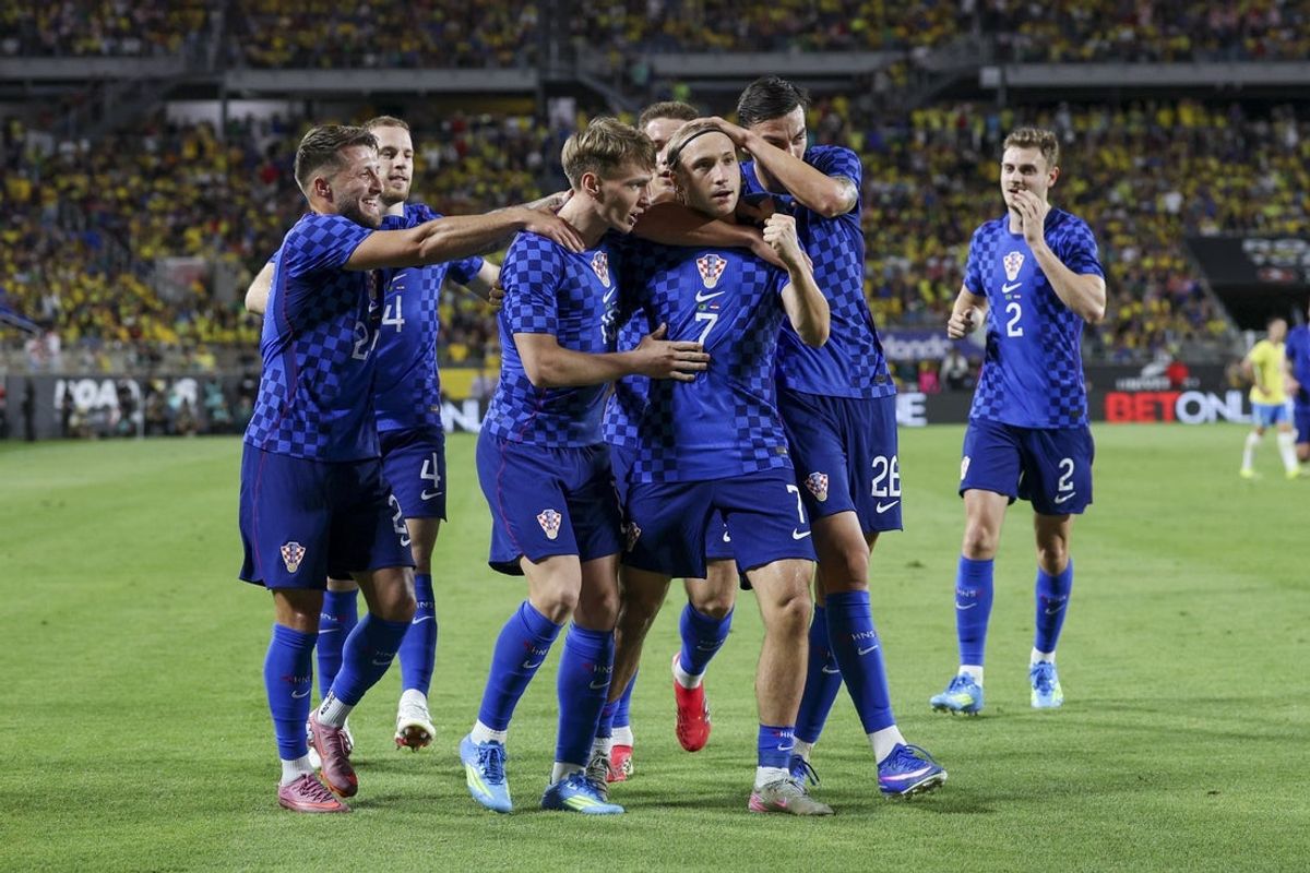 Mar 31, 2026; Orlando, Florida, USA; Croatia midfielder Lovro Majer (7) celebrates after scoring a goal against Brazil in the second half during an international friendly at Camping World Stadium. Mandatory Credit: Nathan Ray Seebeck-Imagn Images