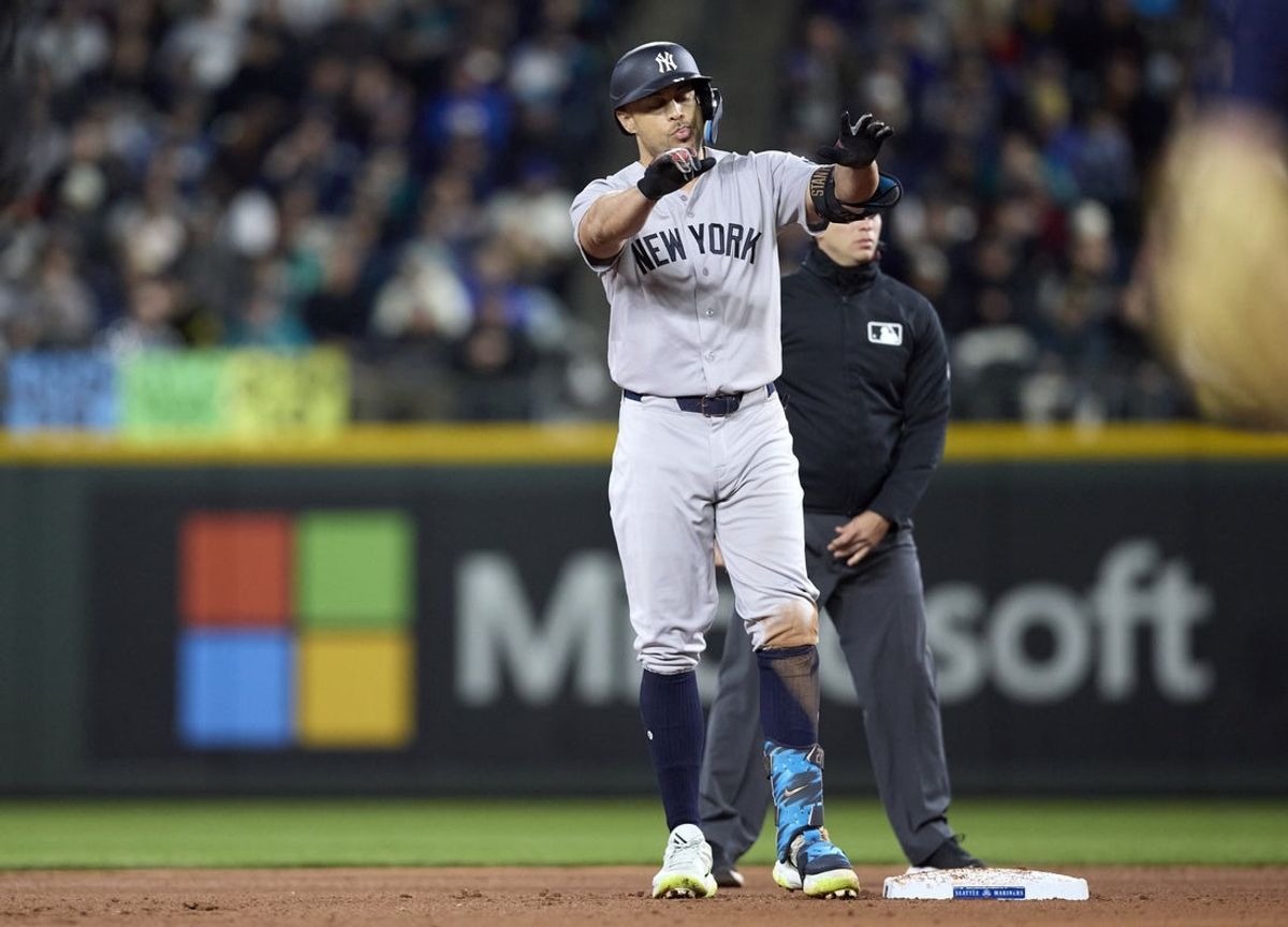 Mar 31, 2026; Seattle, Washington, USA; New York Yankees designated hitter Giancarlo Stanton (27) stands on second base after hitting an RBI double against the Seattle Mariners during the sixth inning at T-Mobile Park. Mandatory Credit: John Froschauer-Imagn Images