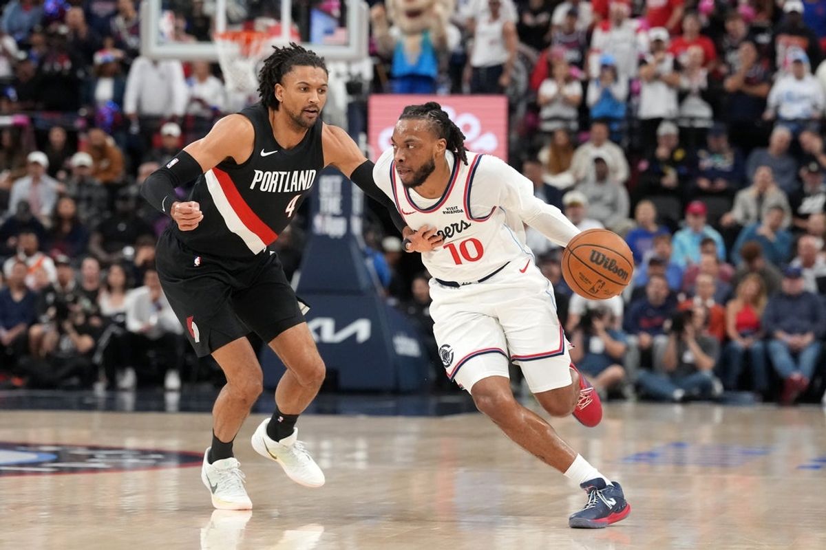 Mar 31, 2026; Inglewood, California, USA;  LA Clippers guard Darius Garland (10) dribbles the ball against Portland Trail Blazers guard Matisse Thybulle (4) during the first half at Intuit Dome. Mandatory Credit: Kirby Lee-Imagn Images