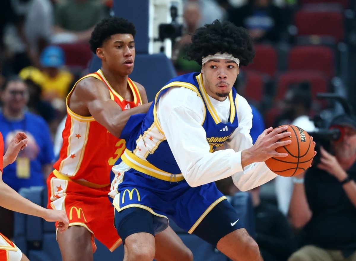 Mar 31, 2026; Glendale, AZ, USA; Tyran Stokes (4) controls the ball against Bruce Branch III (3) during the McDonalds All American Boys Game at Desert Diamond Arena. Mandatory Credit: Mark J. Rebilas-Imagn Images