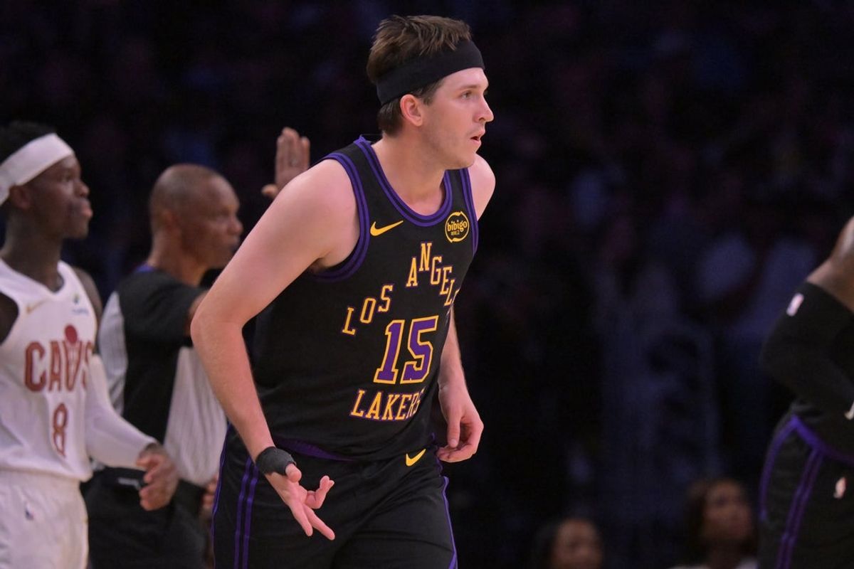 Mar 31, 2026; Los Angeles, California, USA;  Los Angeles Lakers guard Austin Reaves (15) heads down court after a three-point basket in the second half against the Cleveland Cavaliers at Crypto.com Arena. Mandatory Credit: Jayne Kamin-Oncea-Imagn Images