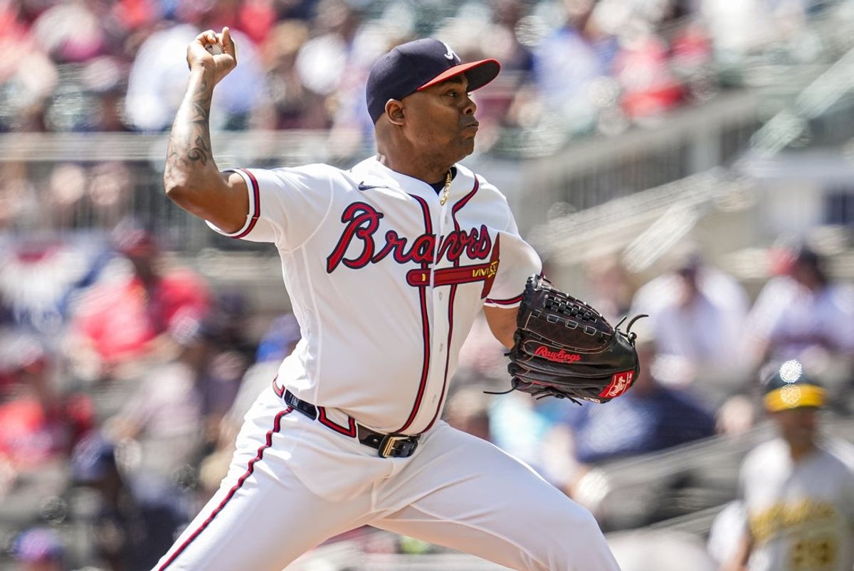 Apr 1, 2026; Cumberland, Georgia, USA; Atlanta Braves pitcher Raisel Iglesias (26) pitches against the Athletics during the ninth  inning at Truist Park. Mandatory Credit: Dale Zanine-Imagn Images
