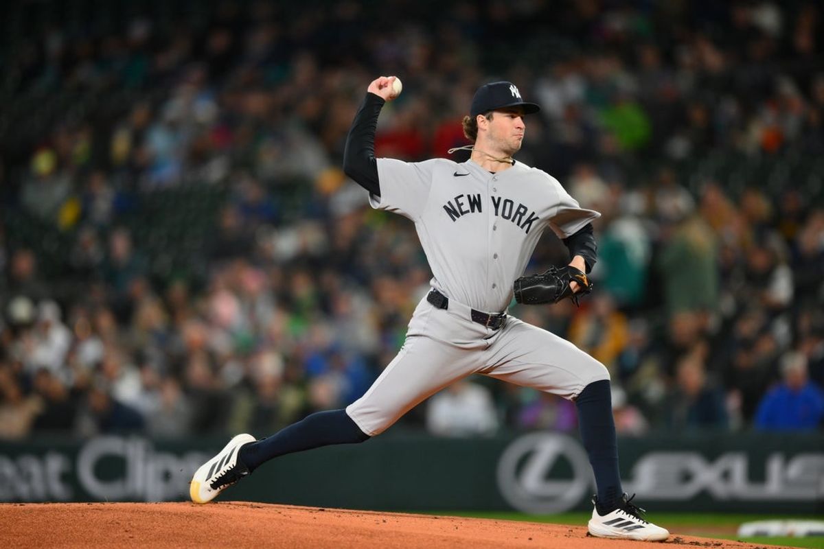 Apr 1, 2026; Seattle, Washington, USA; New York Yankees starting pitcher Cam Schlittler (31) pitches to the Seattle Mariners during the first inning at T-Mobile Park. Mandatory Credit: Steven Bisig-Imagn Images