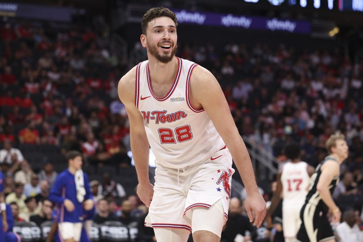 Apr 1, 2026; Houston, Texas, USA; Houston Rockets center Alperen Sengun (28) reacts after a play during the first half against the Milwaukee Bucks at Toyota Center. Mandatory Credit: Troy Taormina-Imagn Images
