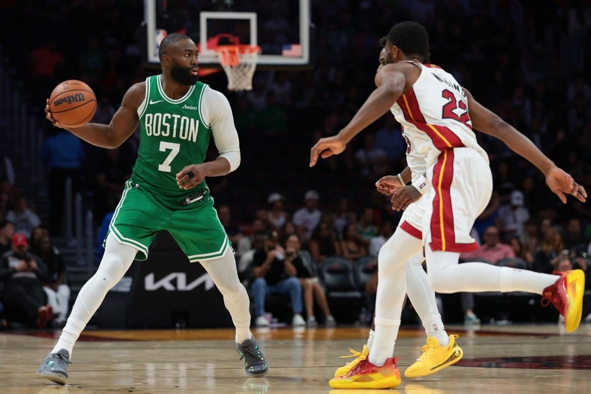 Apr 1, 2026; Miami, Florida, USA; Boston Celtics guard Jaylen Brown (7) controls the basketball against the Miami Heat during the fourth quarter at Kaseya Center. Mandatory Credit: Sam Navarro-Imagn Images