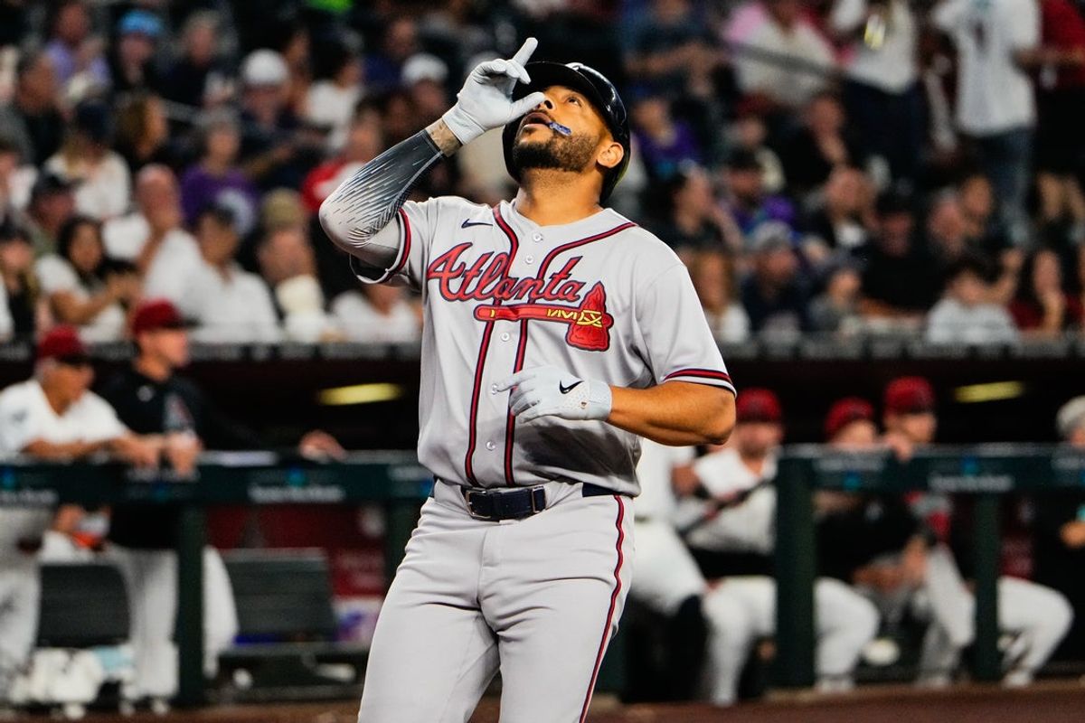 Apr 2, 2026; Phoenix, Arizona, USA; Atlanta Braves designated hitter Dominic Smith (8) celebrates a home run during the third inning against the Arizona Diamondbacks at Chase Field. Mandatory Credit: Arianna Grainey-Imagn Images