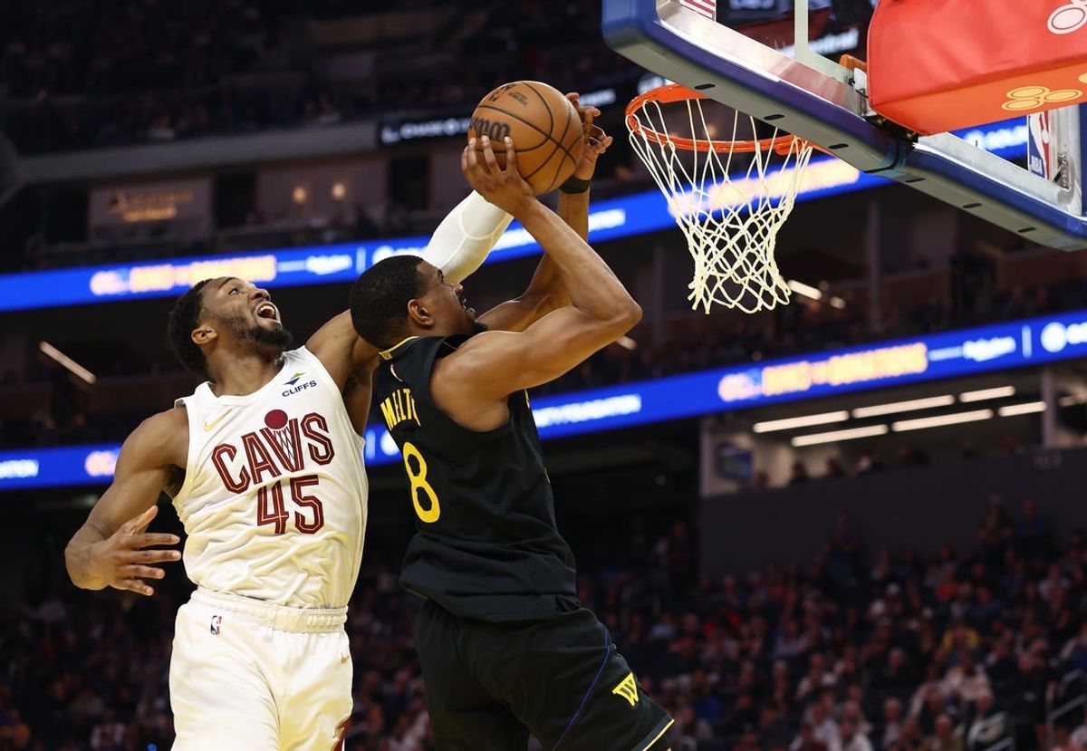 Apr 2, 2026; San Francisco, California, USA; Cleveland Cavaliers guard Donovan Mitchell (45) blocks the shot by Golden State Warriors forward/center De'Anthony Melton (8) during the second quarter at Chase Center. Mandatory Credit: Kelley L Cox-Imagn Images