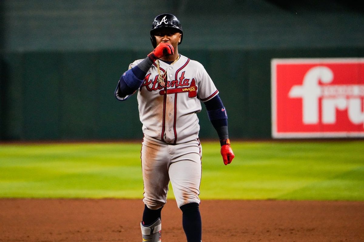 Apr 2, 2026; Phoenix, Arizona, USA; Atlanta Braves second baseman Ozzie Albies (1) celebrates during the fifth inning against the Arizona Diamondbacks at Chase Field. Mandatory Credit: Arianna Grainey-Imagn Images