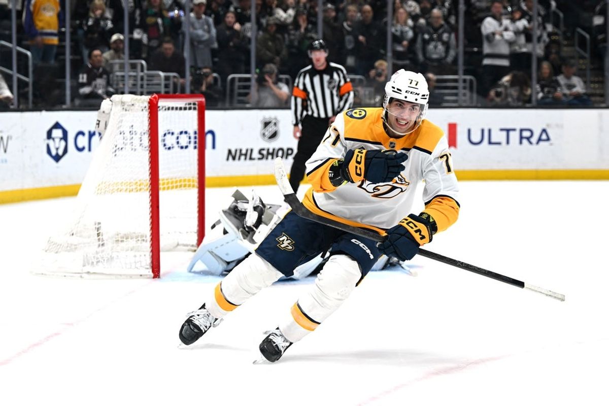 Apr 2, 2026; Los Angeles, California, USA; Nashville Predators right wing Luke Evangelista (77) celebrates after winning the penalty shootout against the Los Angeles Kings at Crypto.com Arena. Mandatory Credit: Griffin Hooper-Imagn Images