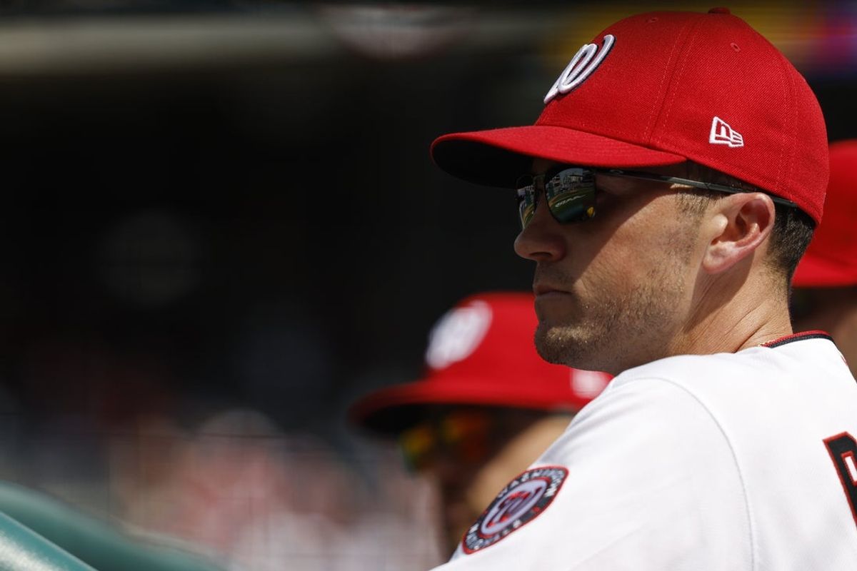 Apr 3, 2026; Washington, District of Columbia, USA; Washington Nationals manager Blake Butera (10) looks on from the dugout against the Los Angeles Dodgers during the fifth inning at Nationals Park. Mandatory Credit: Geoff Burke-Imagn Images