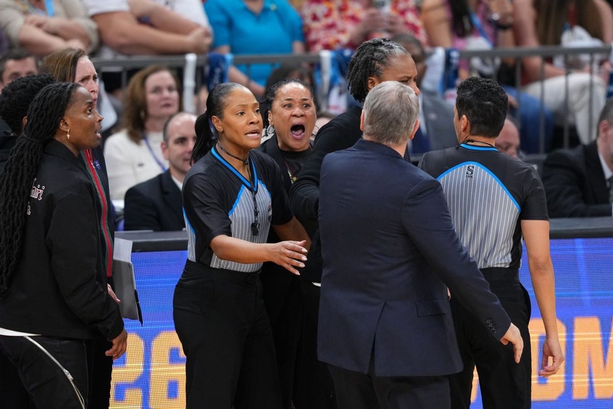 Apr 3, 2026; Phoenix, AZ, USA; UConn Huskies head coach Geno Auriemma and South Carolina Gamecocks head coach Dawn Staley react in the second half during a semifinal of the Final Four of the women's 2026 NCAA Tournament at Mortgage Matchup Center. Mandatory Credit: Joe Camporeale-Imagn Images