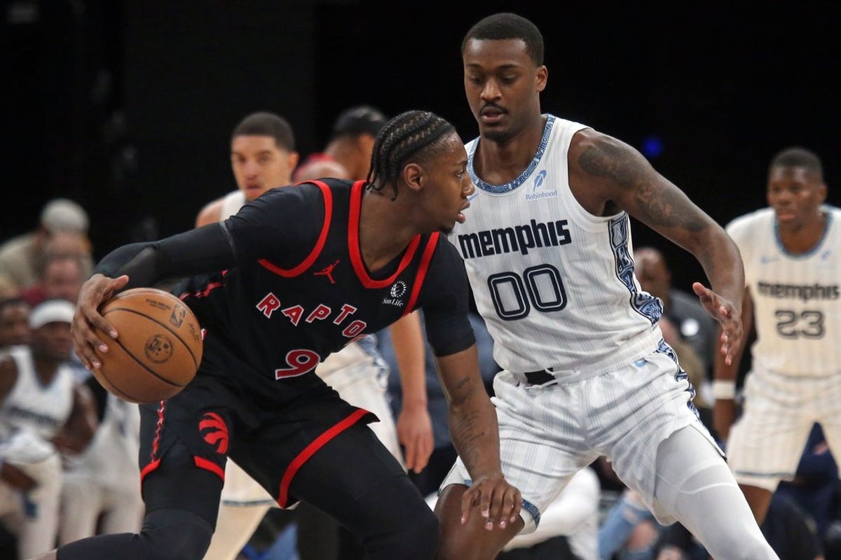 Apr 3, 2026; Memphis, Tennessee, USA; Toronto Raptors forward RJ Barrett (9) dribbles as Memphis Grizzlies forward Dariq Whitehead (00) defends during the first quarter at FedExForum. Mandatory Credit: Petre Thomas-Imagn Images