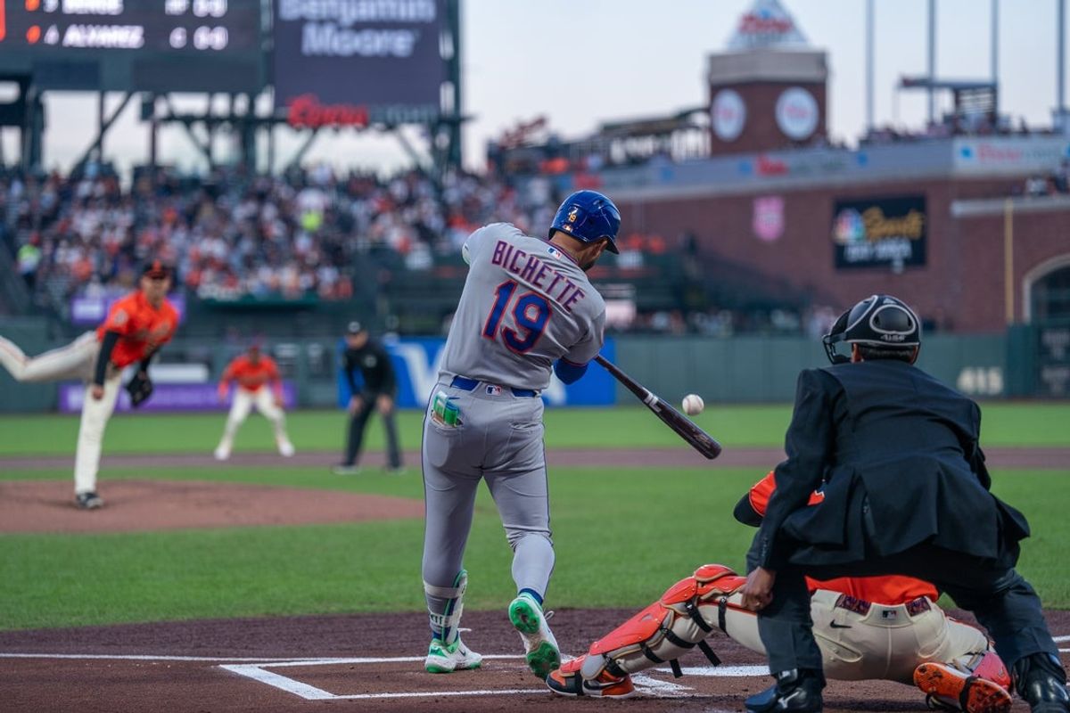 Apr 3, 2026; San Francisco, California, USA; New York Mets third baseman Bo Bichette (19) hits an RBI single against the San Francisco Giants during the first inning at Oracle Park. Mandatory Credit: Neville E. Guard-Imagn Images