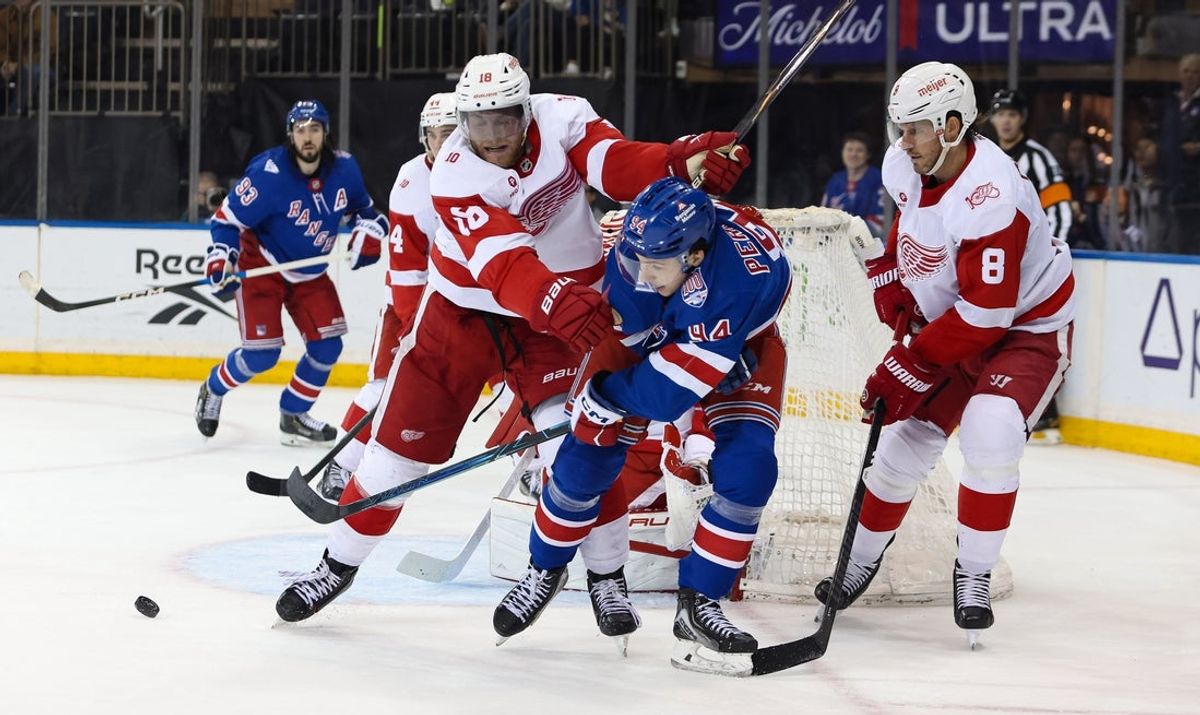 Apr 4, 2026; New York, New York, USA; New York Rangers right wing Gabe Perreault (94) in action against Detroit Red Wings center Andrew Copp (18) during the second period at Madison Square Garden. Mandatory Credit: Danny Wild-Imagn Images
