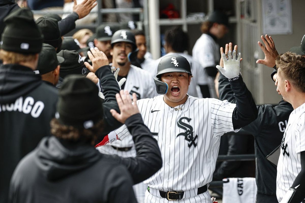 Apr 4, 2026; Chicago, Illinois, USA; Chicago White Sox first baseman Munetaka Murakami (5) celebrates with teammates in the dugout after hitting a two-run home run against the Toronto Blue Jays during the sixth inning at Rate Field. Mandatory Credit: Kamil Krzaczynski-Imagn Images