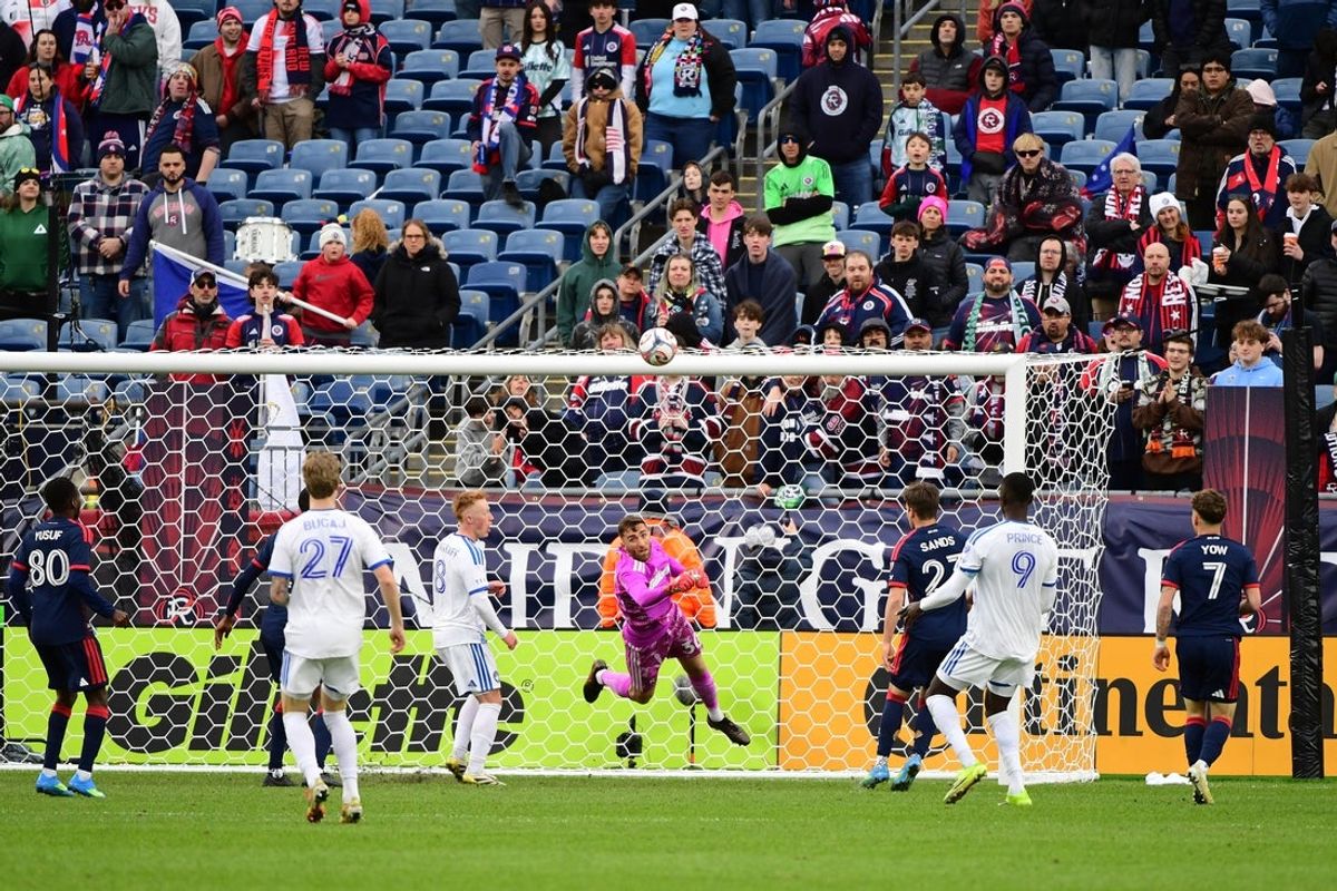 Apr 4, 2026; Foxborough, Massachusetts, USA;  New England Revolution goalkeeper Matt Turner (30) makes a save during the first half against CF Montreal at Gillette Stadium. Mandatory Credit: Bob DeChiara-Imagn Images