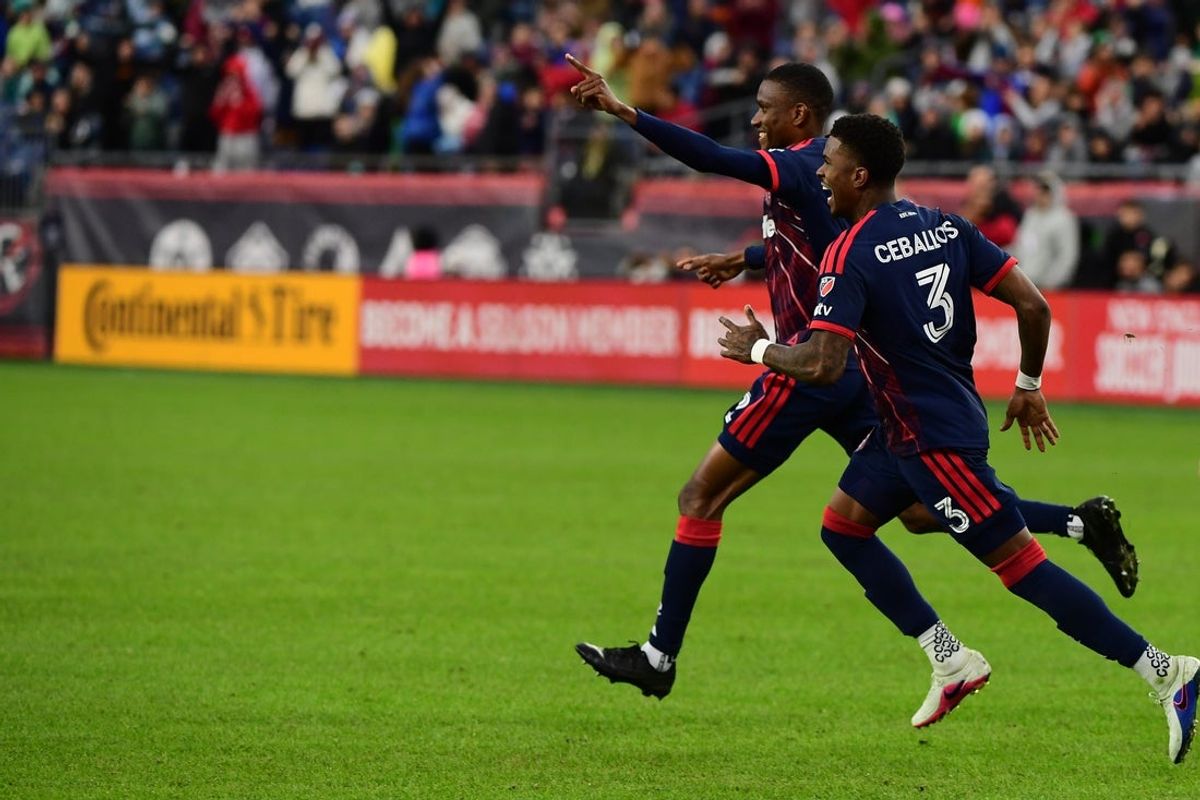 Apr 4, 2026; Foxborough, Massachusetts, USA; New England Revolution defender Mamadou Fofana (2) reacts with defender Brayan Ceballos (3) after scoring a goal during the second half against CF Montréal at Gillette Stadium. Mandatory Credit: Bob DeChiara-Imagn Images
