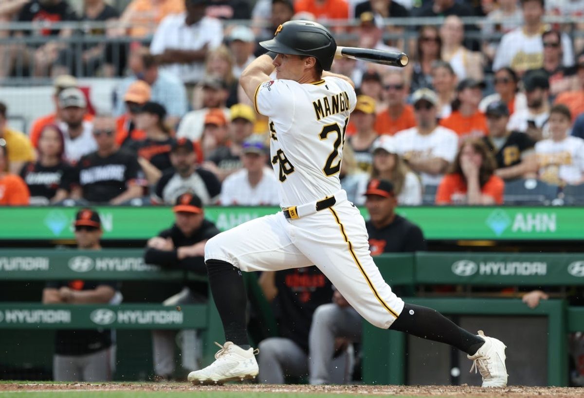 Apr 4, 2026; Pittsburgh, Pennsylvania, USA;  Pittsburgh Pirates pinch hitter Jake Mangum (28) drives in a run on a Baltimore Orioles error during the eighth inning at PNC Park. Mandatory Credit: Charles LeClaire-Imagn Images