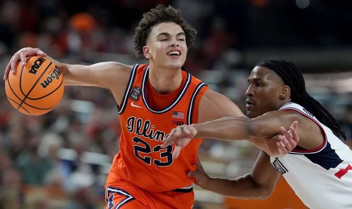 UConn Huskies guard Silas Demary Jr. (2) defends and is called for a foul against Illinois Fighting Illini guard Keaton Wagler (23) on Saturday, April 4, 2026, during a Final Four game at Lucas Oil Stadium in Indianapolis.