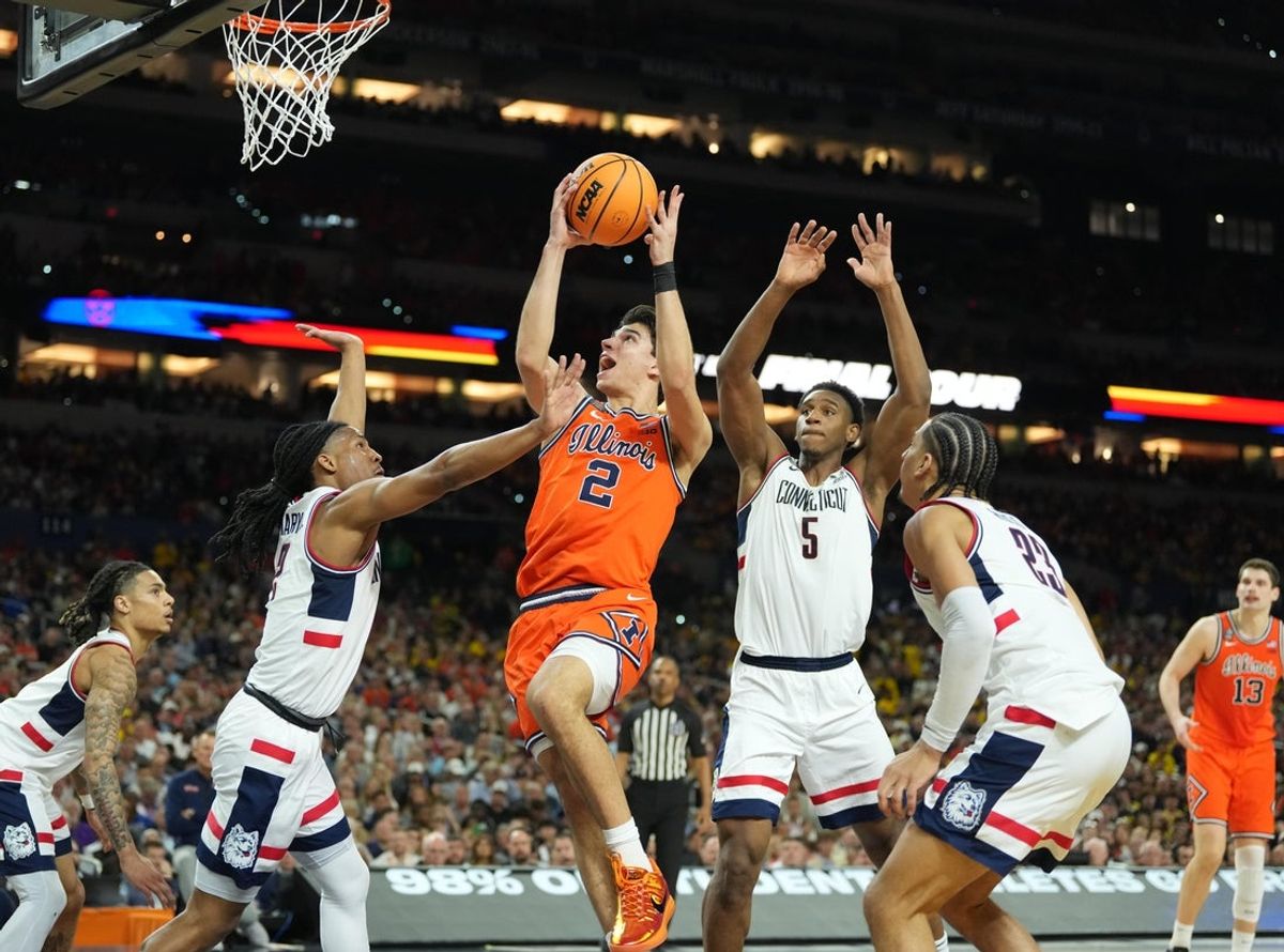Apr 4, 2026; Indianapolis, IN, USA;  Illinois Fighting Illini guard Andrej Stojakovic (2) shoots against Connecticut Huskies guard Silas Demary Jr. (2) in the second half during a semifinal of the Final Four of the men's 2026 NCAA Tournament at Lucas Oil Stadium. Mandatory Credit: Robert Deutsch-Imagn Images