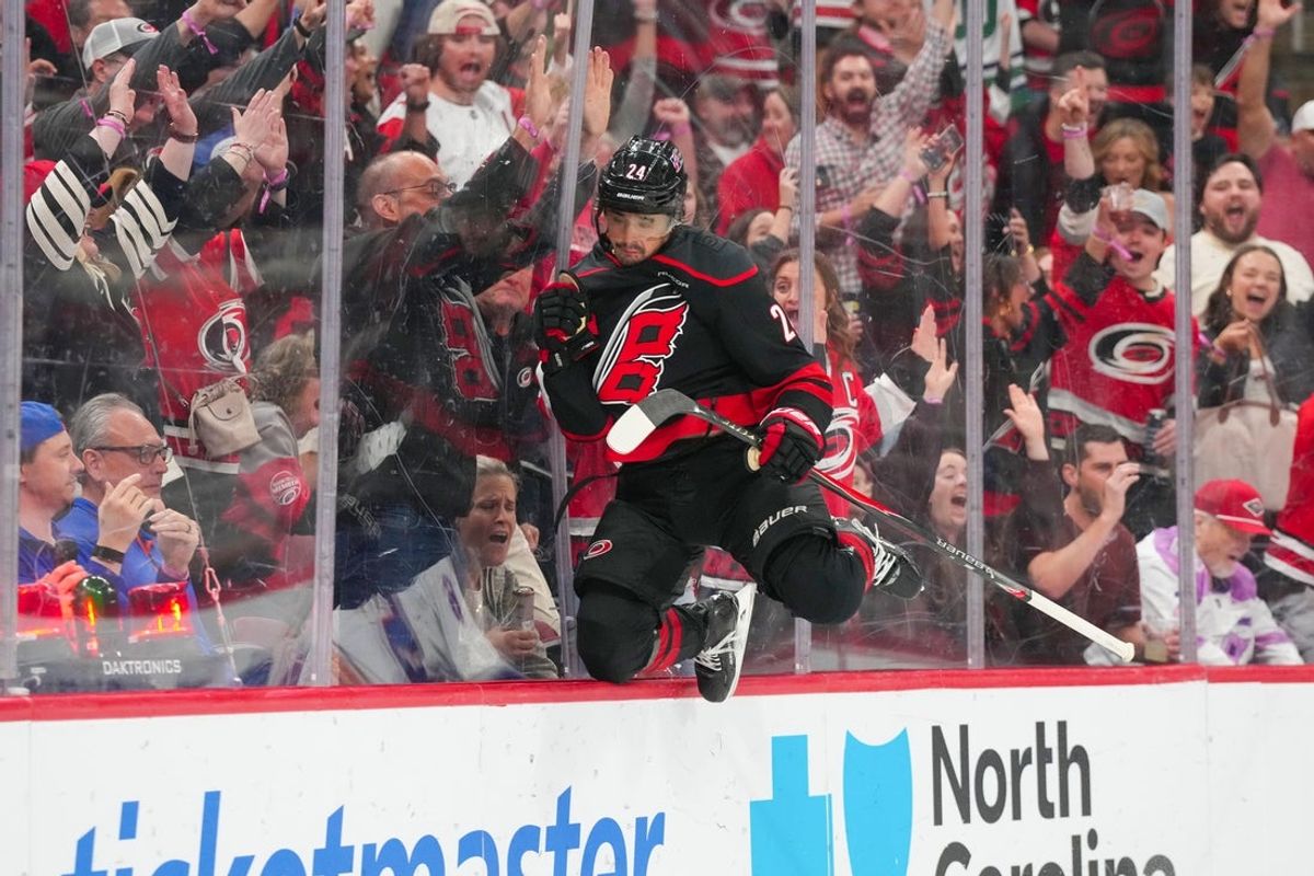 Apr 4, 2026; Raleigh, North Carolina, USA;  Carolina Hurricanes center Seth Jarvis (24) scores a goal on his shot against the New York Islanders during the first period at Lenovo Center. Mandatory Credit: James Guillory-Imagn Images