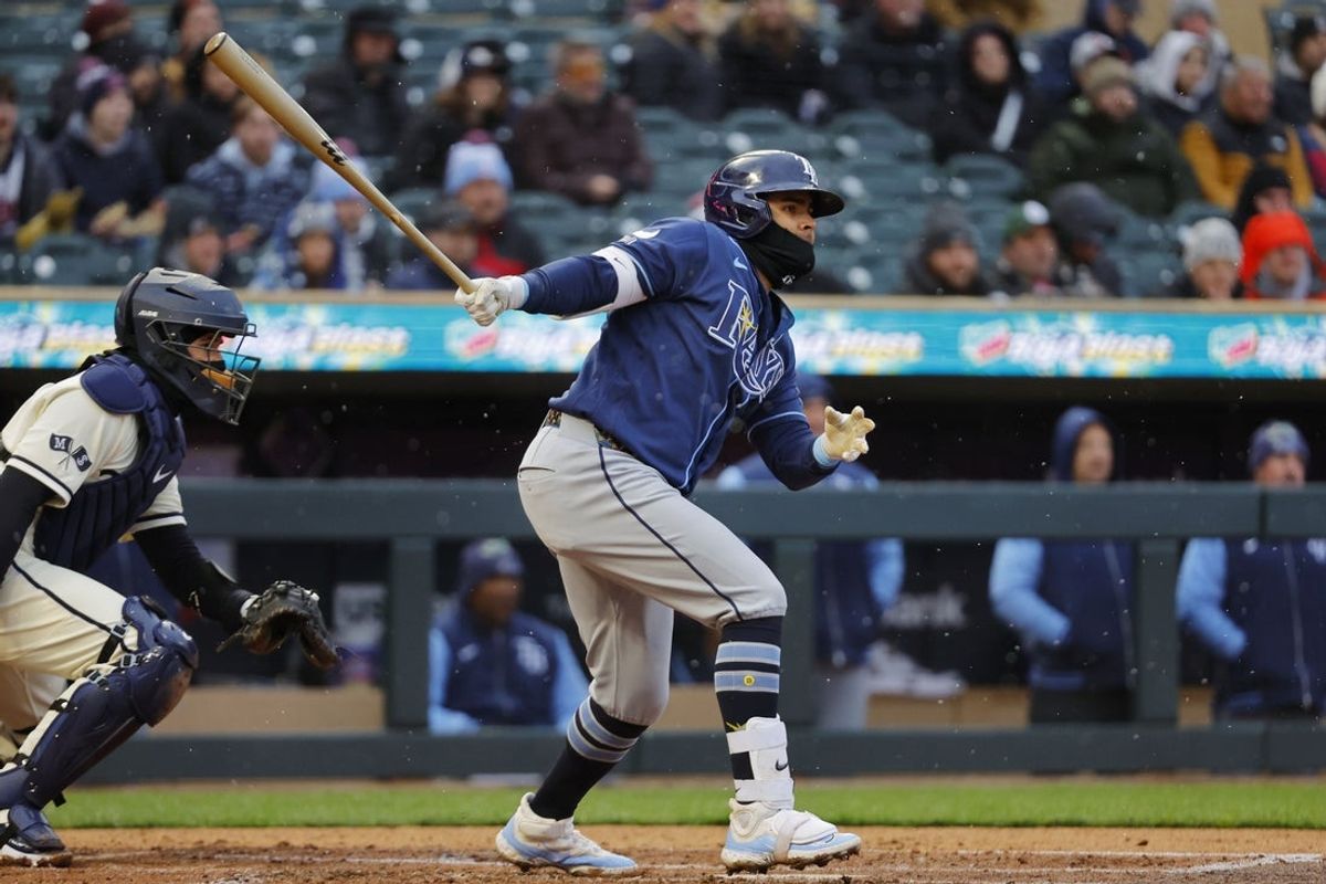 Apr 4, 2026; Minneapolis, Minnesota, USA; Tampa Bay Rays first baseman Jonathan Aranda (8) hits a two run double against the Minnesota Twins in the second inning at Target Field. Mandatory Credit: Bruce Kluckhohn-Imagn Images