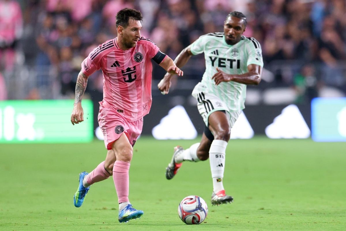 Apr 4, 2026; Miami, Florida, USA; Inter Miami CF runs after the ball defended by Austin FC defender Jon Bell (15) during the second half at Nu Stadium. Mandatory Credit: Nathan Ray Seebeck-Imagn Images