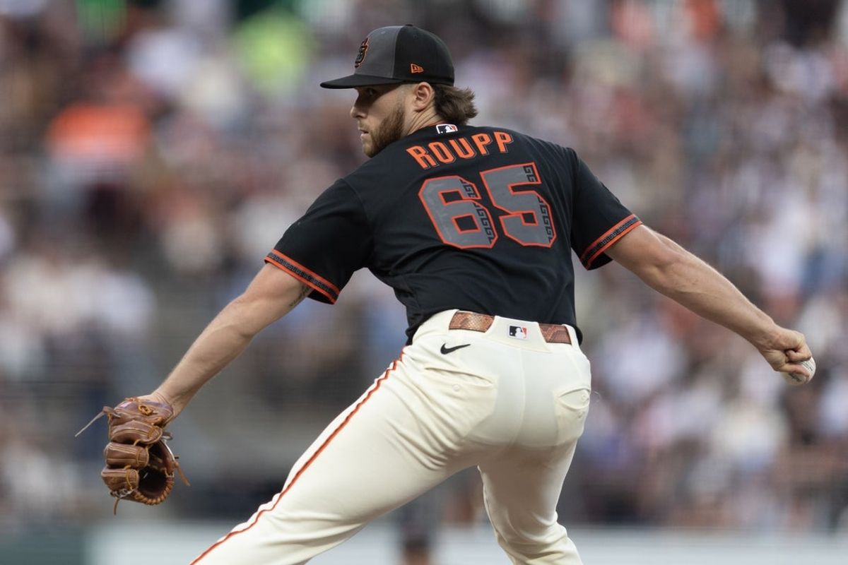 Apr 4, 2026; San Francisco, California, USA; San Francisco Giants starting pitcher Landen Roupp (65) delivers a pitch against the New York Mets during the fourth inning at Oracle Park. Mandatory Credit: D. Ross Cameron-Imagn Images