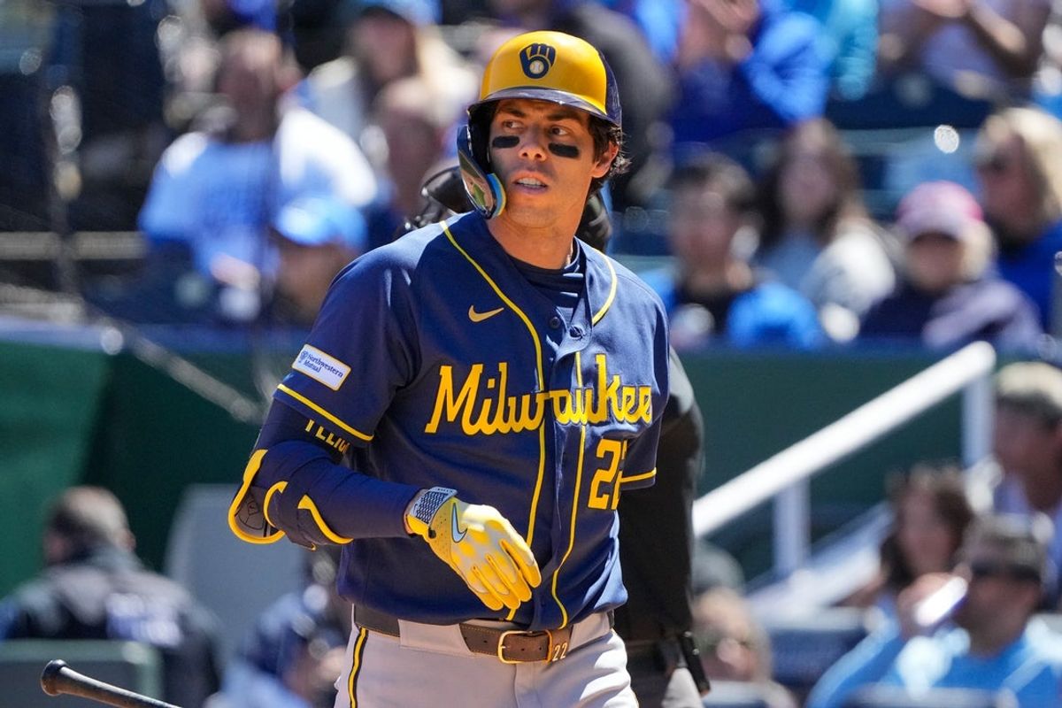 Apr 5, 2026; Kansas City, Missouri, USA; Milwaukee Brewers designated hitter Christian Yelich (22) reacts after striking out against the Kansas City Royals during the third inning at Kauffman Stadium. Mandatory Credit: Denny Medley-Imagn Images