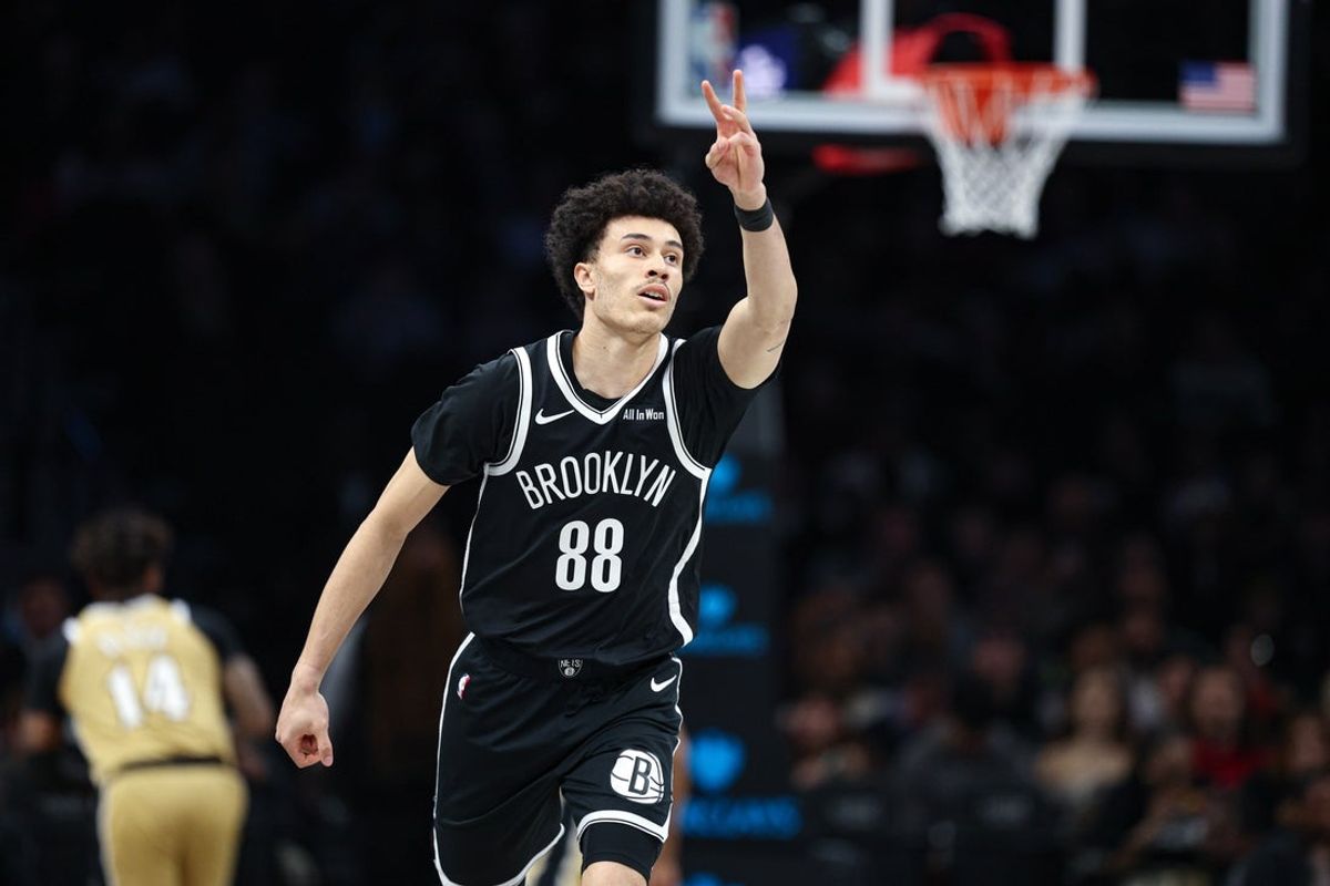 Apr 5, 2026; Brooklyn, New York, USA; Brooklyn Nets guard Nolan Traore (88) reacts after making a three point basket during the first quarter against the Washington Wizards at Barclays Center. Mandatory Credit: Vincent Carchietta-Imagn Images