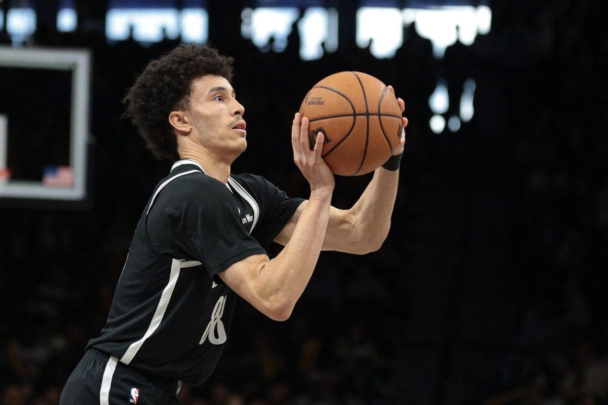 Apr 5, 2026; Brooklyn, New York, USA; Brooklyn Nets guard Nolan Traore (88) shoots the ball during the second half against the Washington Wizards at Barclays Center. Mandatory Credit: Vincent Carchietta-Imagn Images