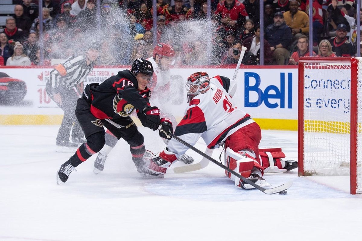 Apr 5, 2026; Ottawa, Ontario, CAN; Ottawa Senators center Tim Stutzle (18) scores against Carolina Hurricanes fgoalie Frederik Andersen (31) in the first period at the Canadian Tire Centre. Mandatory Credit: Marc DesRosiers-IMAGN Images