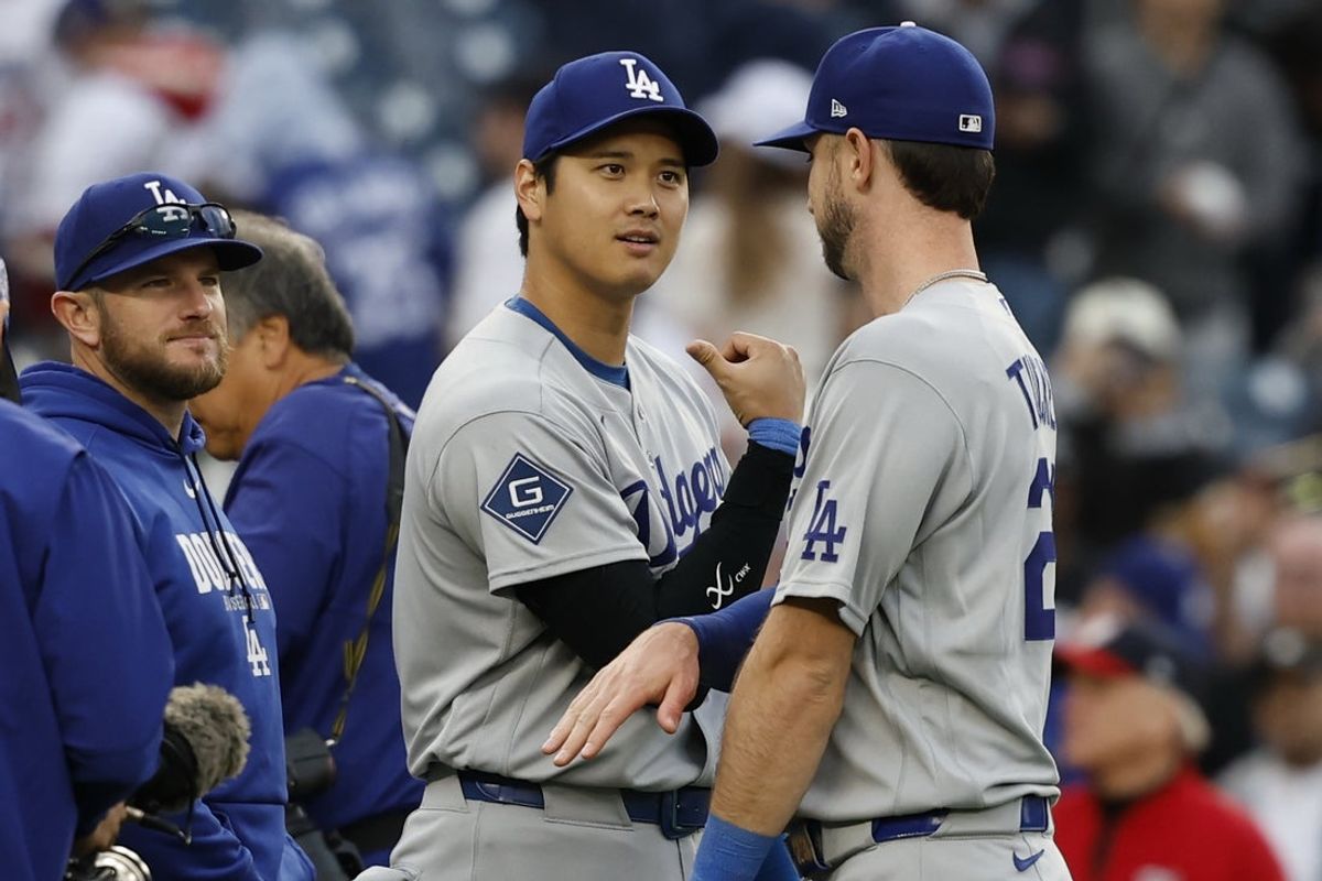 Apr 5, 2026; Washington, District of Columbia, USA; Los Angeles Dodgers two-way player Shohei Ohtani (17) celebrates with Dodgers right fielder Kyle Tucker (23) after their game against the Washington Nationals at Nationals Park. Mandatory Credit: Geoff Burke-Imagn Images
