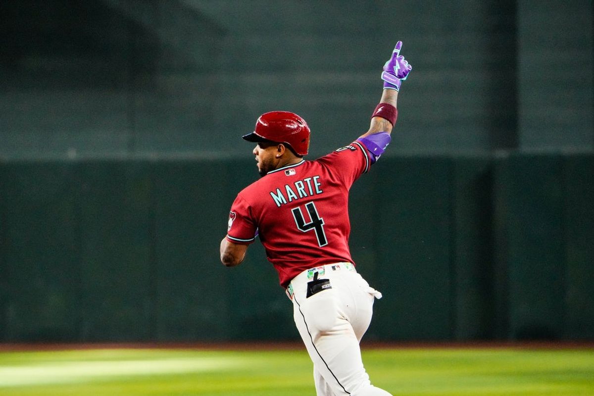 Apr 5, 2026; Phoenix, Arizona, USA; Arizona Diamondbacks second baseman Ketel Marte (4) celebrates his two run home run against the Atlanta Braves  during the tenth inning at Chase Field. Mandatory Credit: Arianna Grainey-Imagn Images