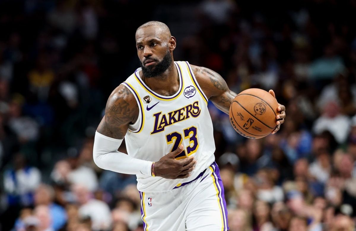 Apr 5, 2026; Dallas, Texas, USA;  Los Angeles Lakers forward LeBron James (23) controls the ball against the Dallas Mavericks during the second half at American Airlines Center. Mandatory Credit: Kevin Jairaj-Imagn Images