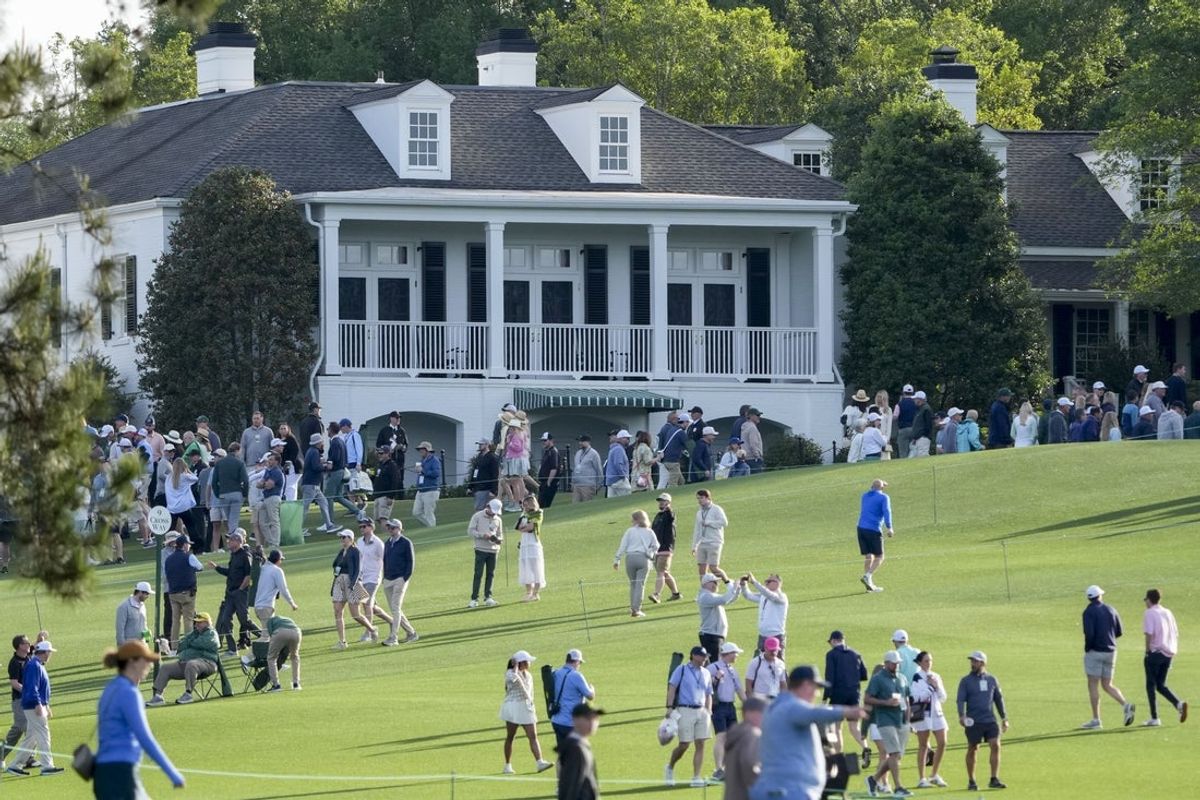 Apr 6, 2026; Augusta, Georgia, USA; Patrons move around the grounds during a practice round for the Masters Tournament at Augusta National Golf Club. Mandatory Credit: Michael Madrid-Imagn Images
