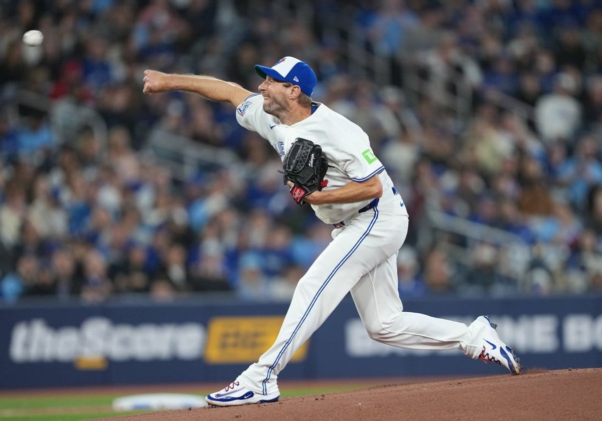 Apr 6, 2026; Toronto, Ontario, CAN; Toronto Blue Jays starting pitcher Max Scherzer (31) throws a pitch against the Los Angeles Dodgers during the first inning at Rogers Centre. Mandatory Credit: Nick Turchiaro-Imagn Images