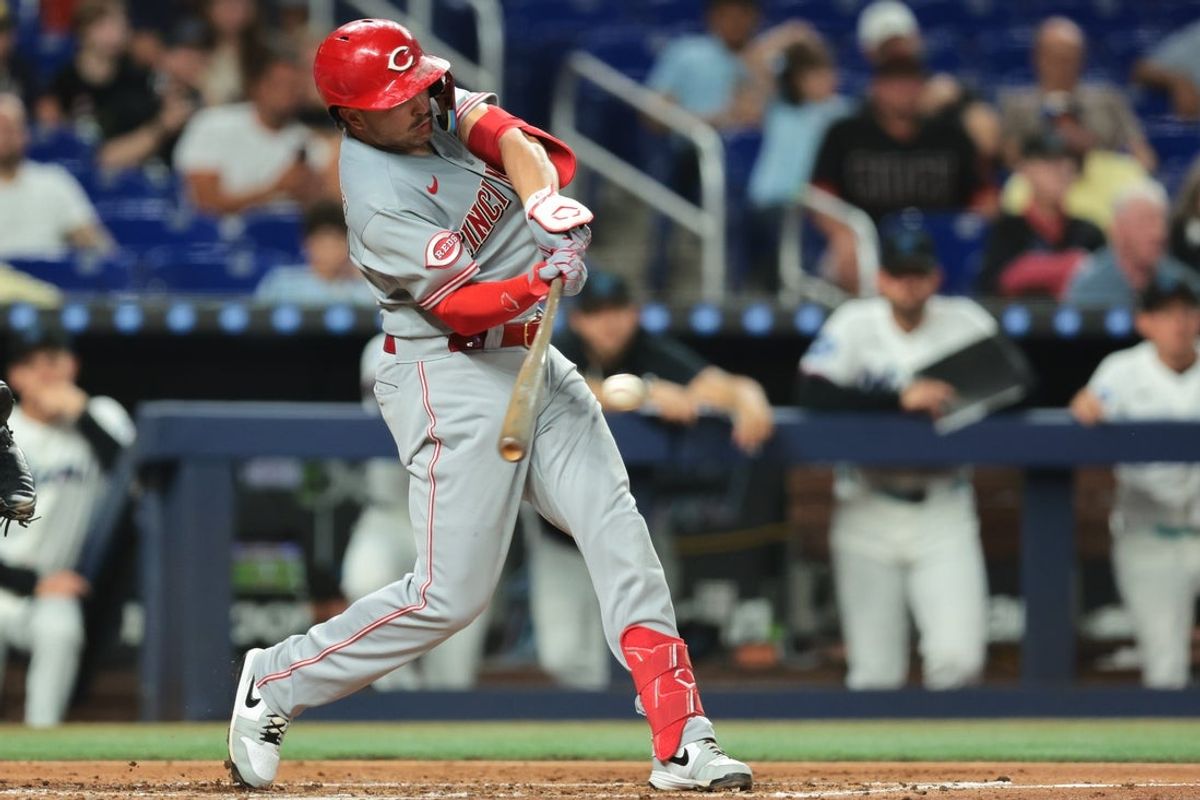 Apr 6, 2026; Miami, Florida, USA; Cincinnati Reds first baseman Sal Stewart (27) hits an RBI single against the Miami Marlins during the fourth inning at loanDepot Park. Mandatory Credit: Sam Navarro-Imagn Images