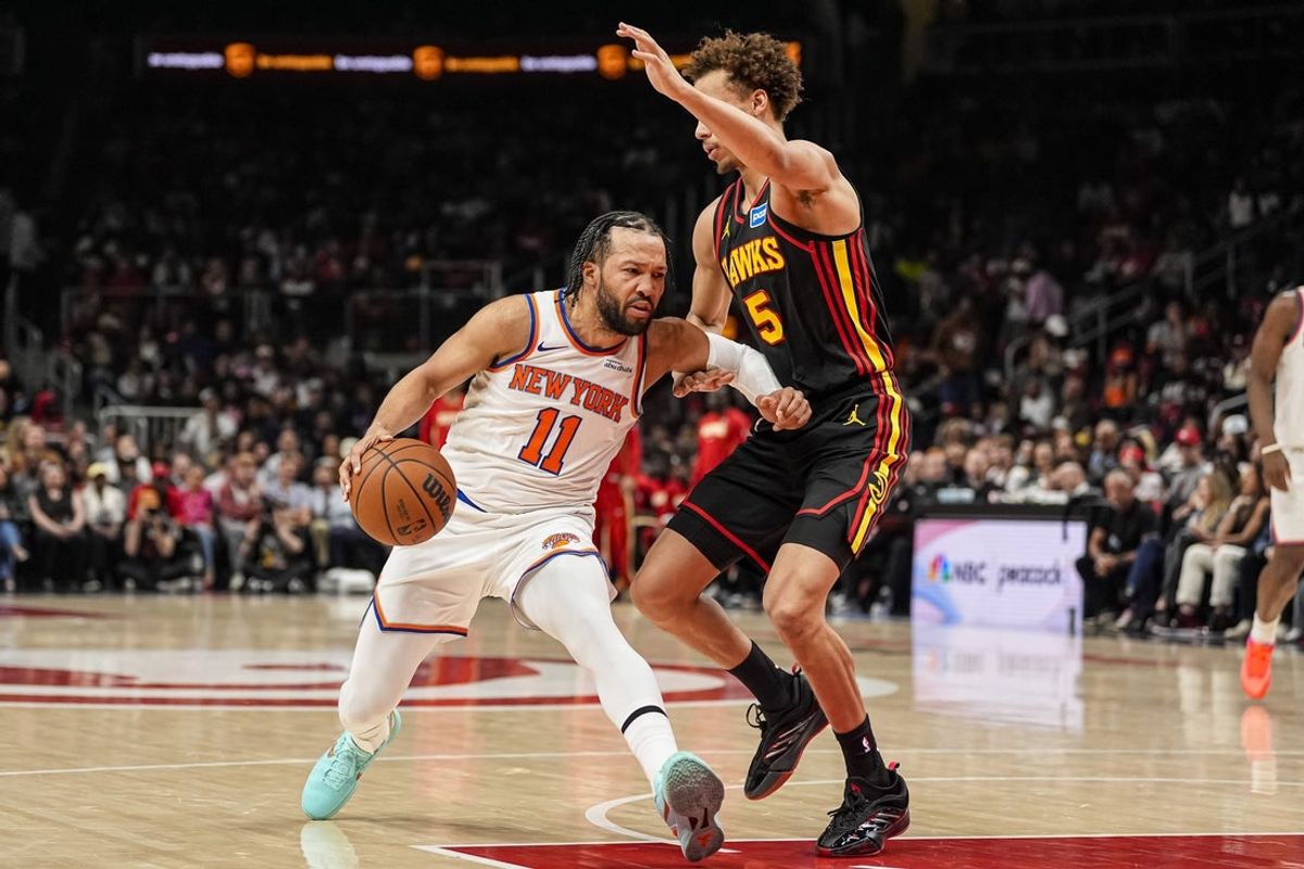 Apr 6, 2026; Atlanta, Georgia, USA; New York Knicks guard Jalen Brunson (11) dribbles against Atlanta Hawks guard Dyson Daniels (5) during the first half at State Farm Arena. Mandatory Credit: Dale Zanine-Imagn Images