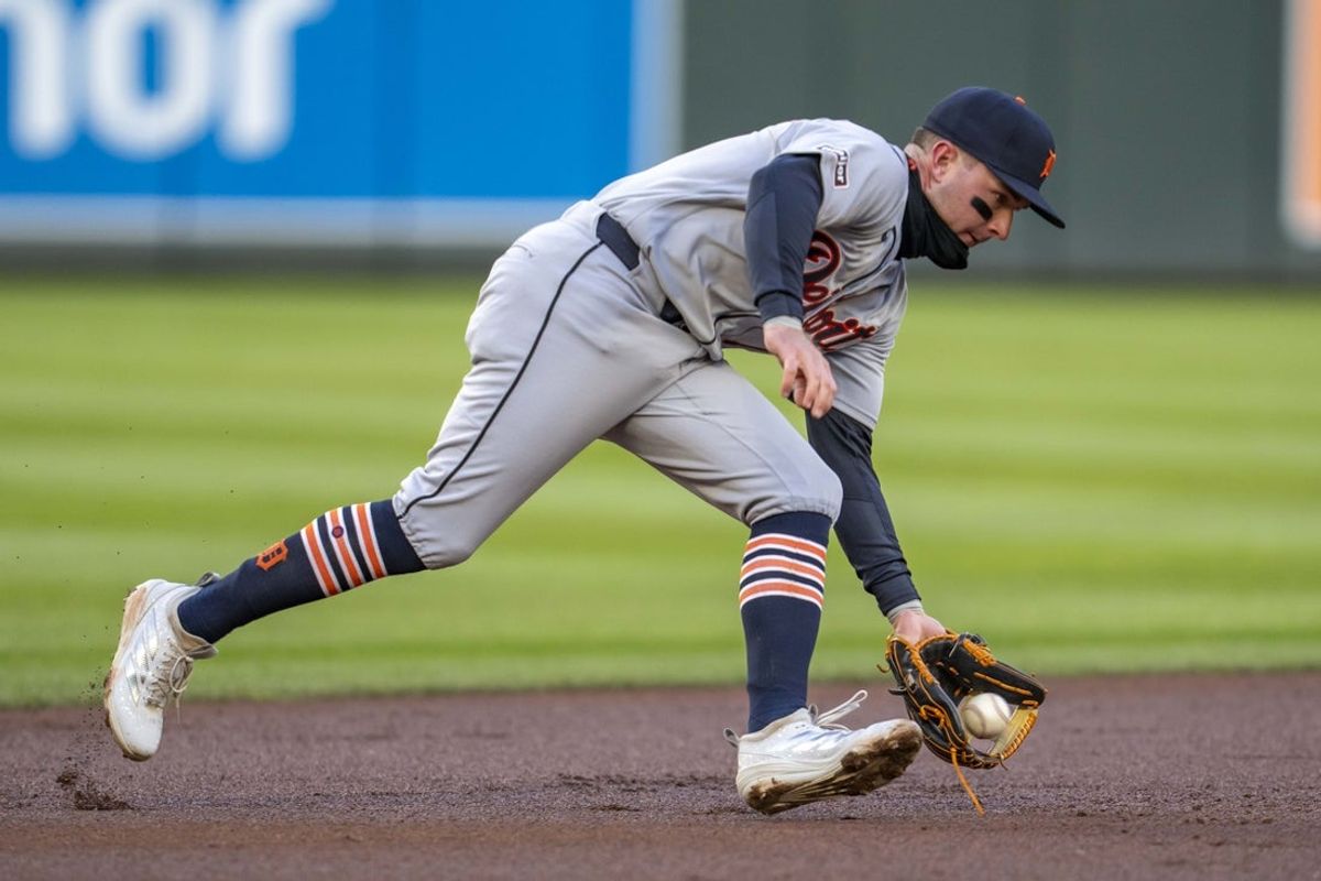 Apr 6, 2026; Minneapolis, Minnesota, USA; Detroit Tigers shortstop Kevin McGonigle (7) fields a ground ball against the Minnesota Twins in the first inning at Target Field. Mandatory Credit: Jesse Johnson-Imagn Images